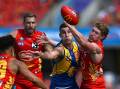 Ultra-competitiveness is what sets Elliot Yeo (centre) apart for West Coast, Jeremy McGovern says. (Dave Hunt/AAP PHOTOS)