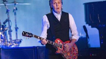 Paul McCartney is executive producer of a restored version of The Beatles film Let it Be. (AP PHOTO)