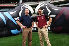 Michael Maguire (l) and Billy Slater will soon name their first squads for 2024's State of Origin. (Con Chronis/AAP PHOTOS)